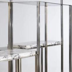 Libreria Colonna in metallo dorato con ripiani in marmo*Nobe Italia