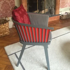 Poltrona Secreto arancione e grigia*Colé New