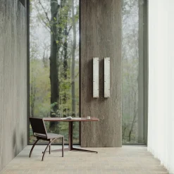 Sedia Cylindre in ferro con finitura bronzo e pelle*Tato Best