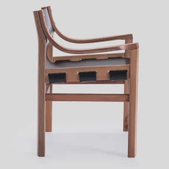 Sedia Old Livoni in pelle nera vintage con struttura in legno di noce di Studio Livoni*Livoni 1895 Online