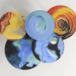 Tavolino rotondo Astraliti in metallo dai toni caldi #1*Cupioli New