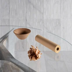 Tavolo da pranzo rotondo in marmo grigio e vetro Filo*Luce Di Carrara Outlet